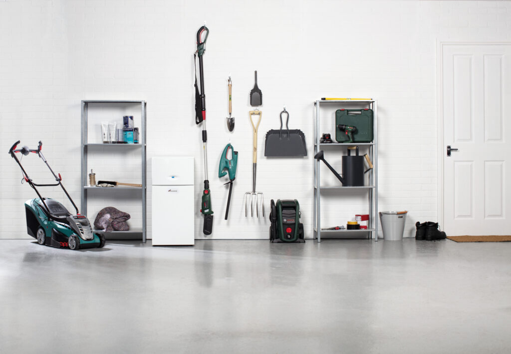 garage with shelves, tools and a lpg boilers
