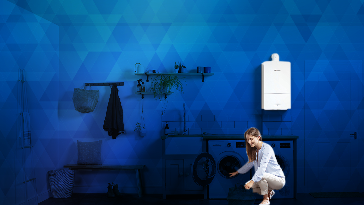 person crouching in front of washing machine with lpg boilers behind them